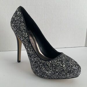 Madden Girl black glitter pumps with 5” heels. Size 7.